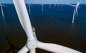 a-group-of-majestic-wind-turbines-stand-tall-in-the-oceanwind-to-generate-clean-energy-in-flevoland