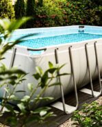 above-ground-rack-swimming-pool-in-the-garden-summer-holiday-recreation