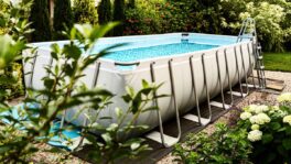 above-ground-rack-swimming-pool-in-the-garden-summer-holiday-recreation